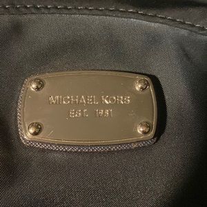 Michael Kors navy blue backpack. Professional look.